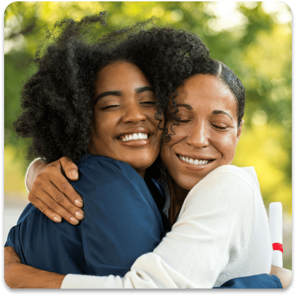 daughter and mother hugging